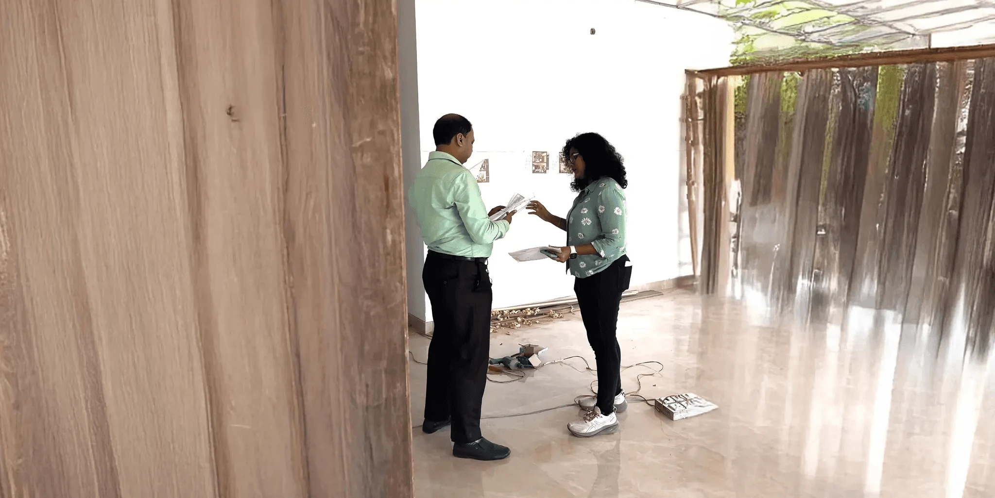 The dining area and kitchen zone of a Studio Contour duplex project in New Town, Kolkata